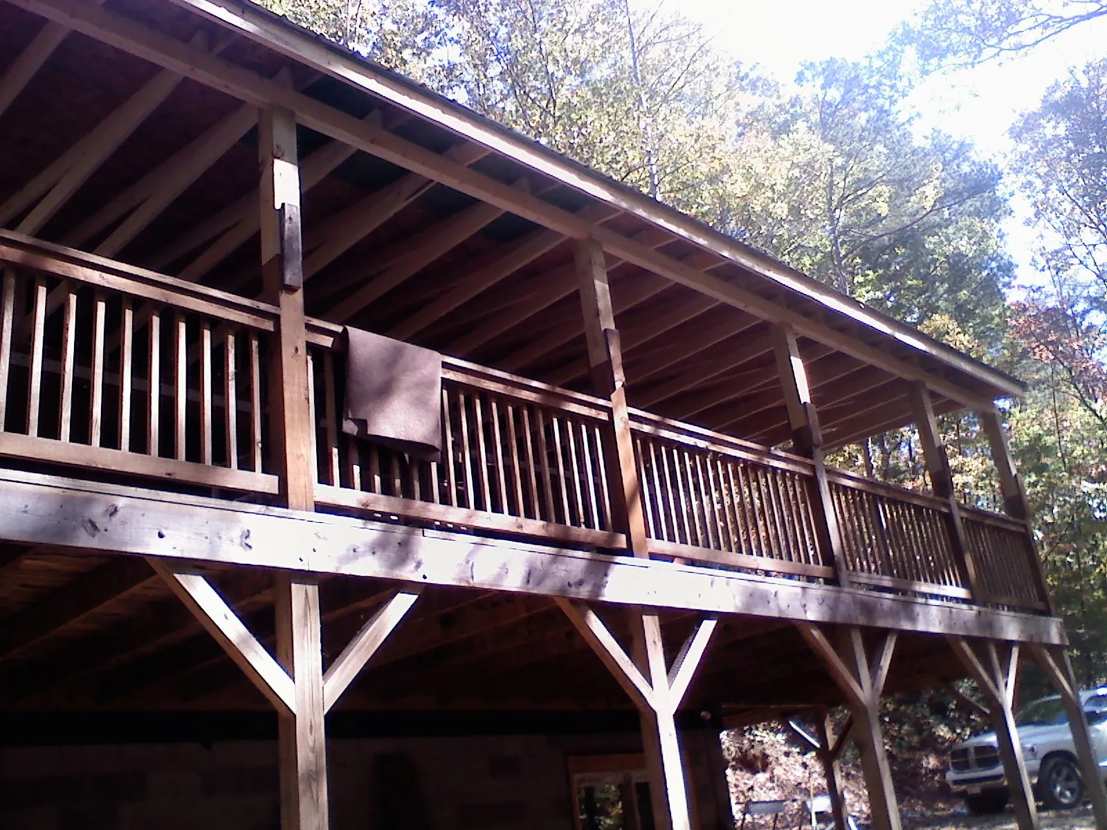 Timber framing under a new elevated porch and deck — Roof Leak Repair in Providence by Roofing Brothers